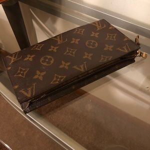 Louis Vuitton clutch. Vintage use for cash/makeup
